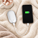 Hand warmer charging a phone as a power bank