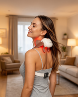 Woman relaxing with the heated neck and shoulder massager
